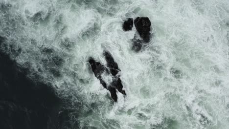 Drone-Orbiting-Over-Stormy-Foamy-Waves-At-The-Rugged-Shoreline