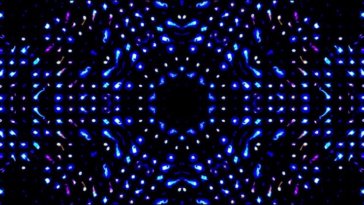 Beautiful abstract video that shines, bright light that arranges subtle colorful movements with blue dots, black background