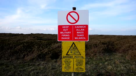 warning sign at military firing range in wales