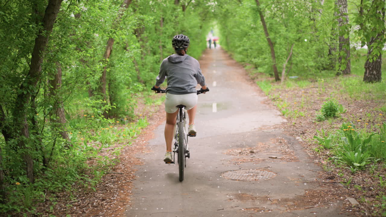 Peaceful Cycling Through Wooded Area, Calm And Mindful Biking Experience Amidst Forest And Morning Light, Tranquil Journey On Forest Trail During Dawn With Gentle Breathing And Soft Sunlight