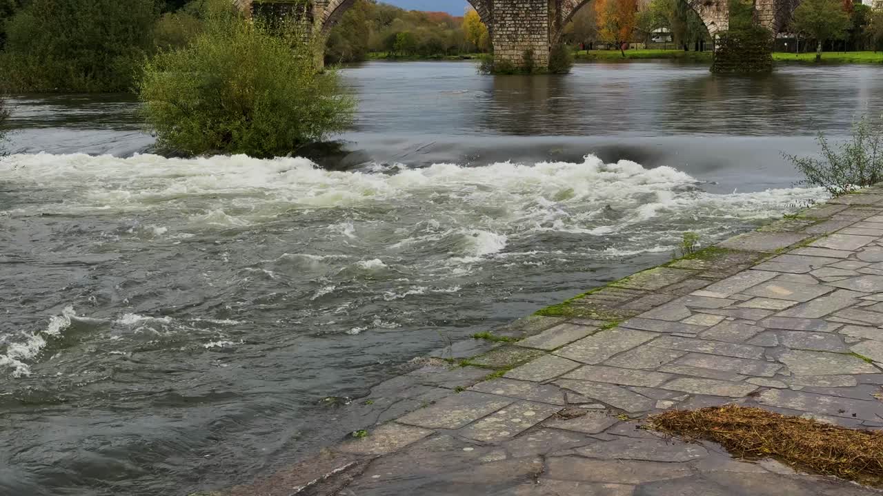 The banks of the Lima River in the city, flooded by Storm Claudia