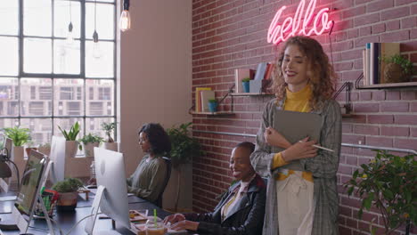 beautiful caucasian business woman team leader enjoying management career checking colleagues working using tablet computer in diverse office workplace walking confident female manager