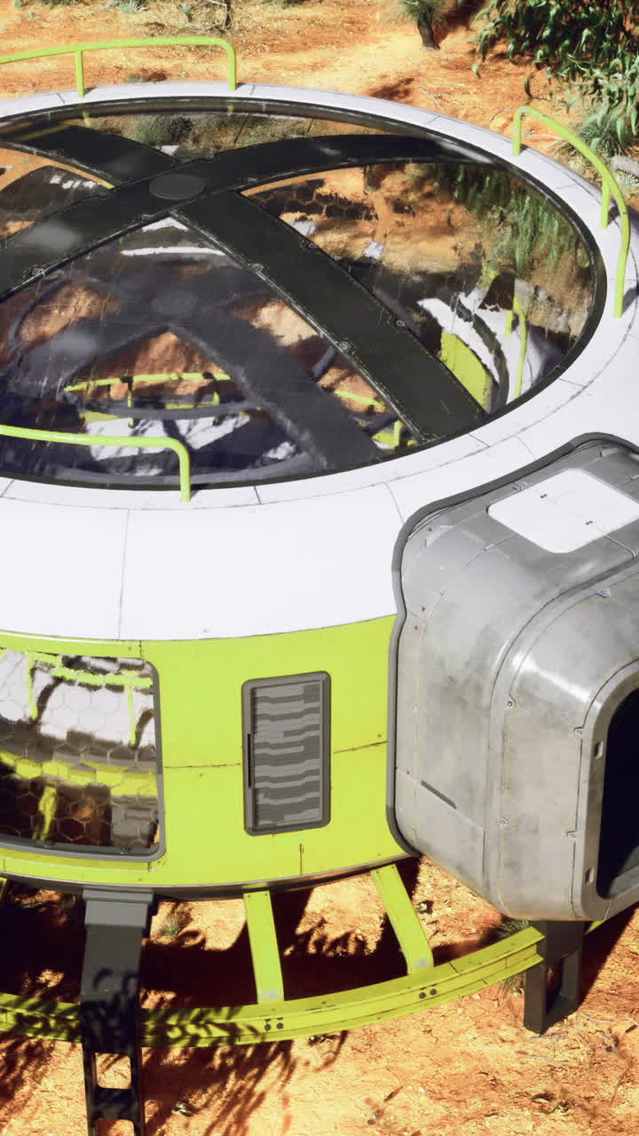 Futuristic structure in a desert landscape surrounded by trees