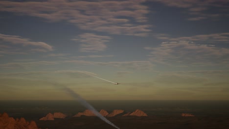 military airplane drops bomb on the battlefield at sunset. war concept