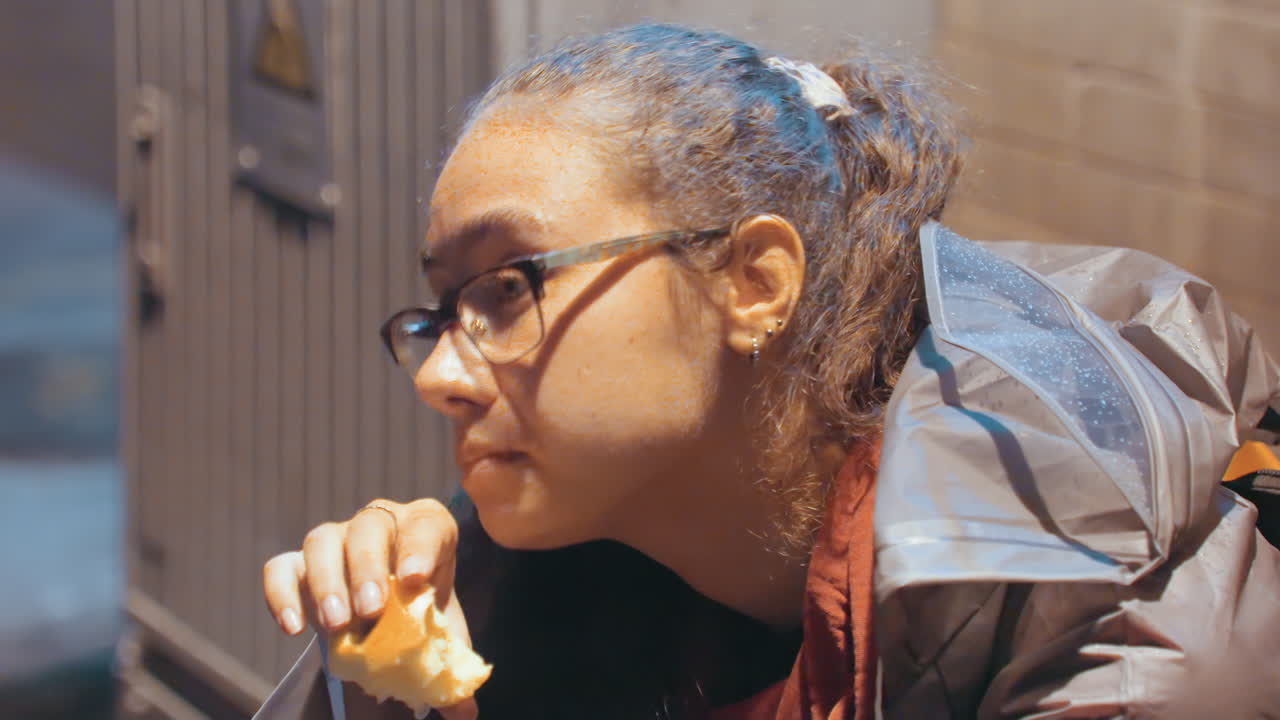 Lady with bun and reflective glasses. Image of woman baker featuring hair bun and mirrored eye glasses. Detailed portrait showcasing woman with hairstyle bun and reflective eyewear expression