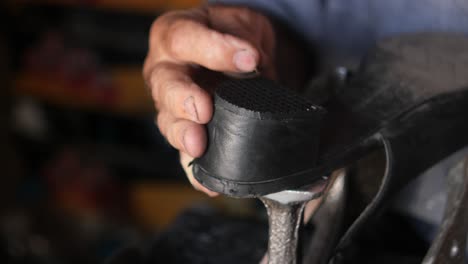 shoe repair in progress