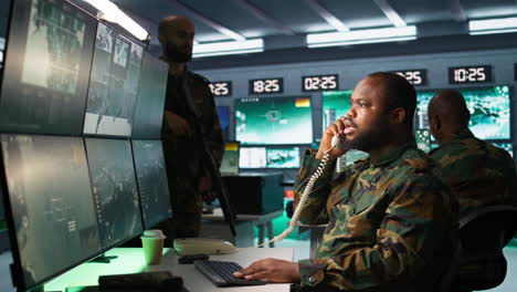 Army-expert-in-telephone-call-in-monitoring-room