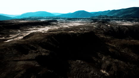 black volcanic basalt rock formations in the low light