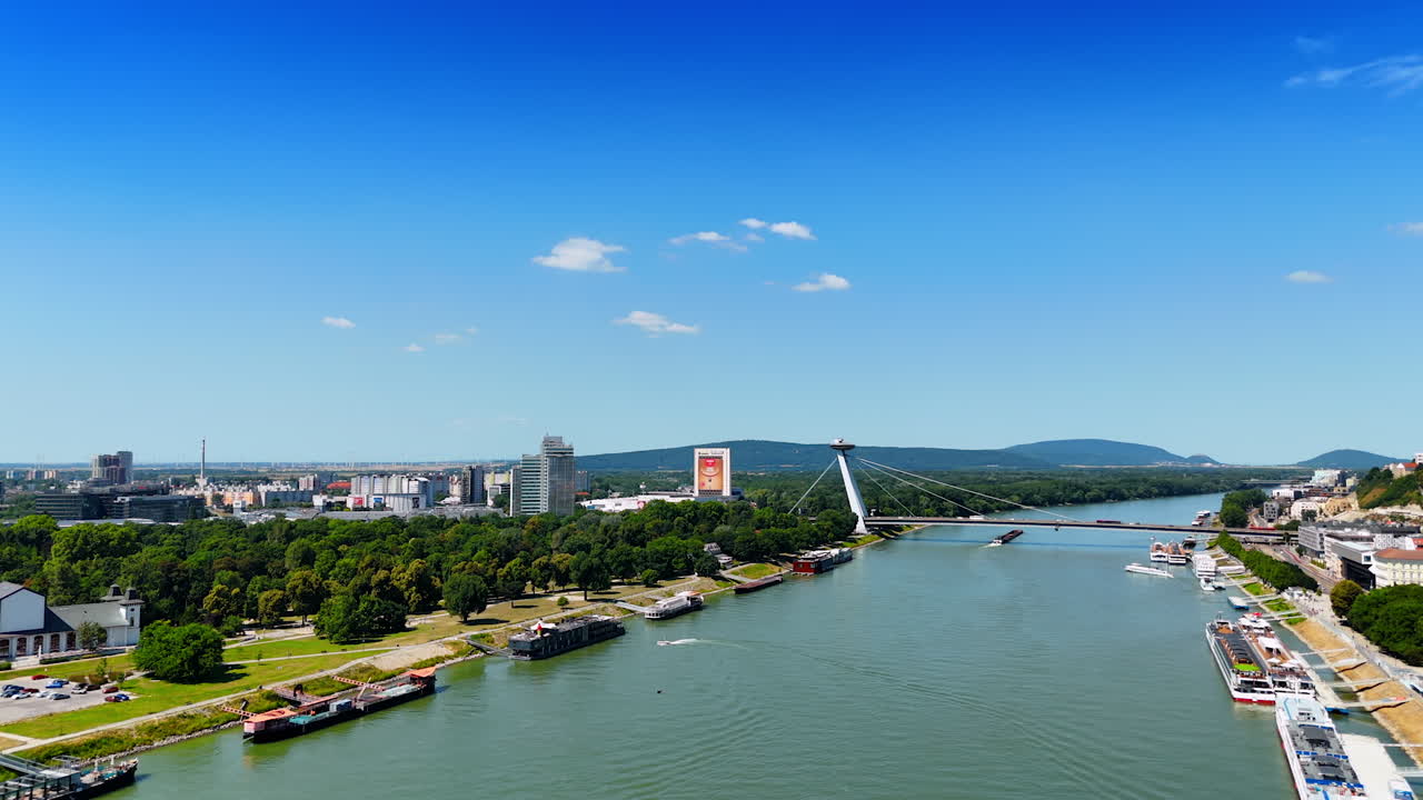 The Danube River in Bratislava, Slovakia. View on the UFO or Bridge of the Slovak National Uprising. Aerial view.