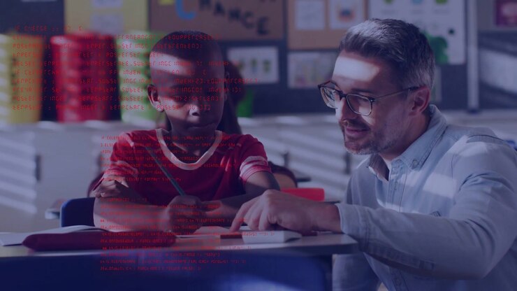 Teacher kneeling by student, leaning and pointing at worksheet, guiding pencil writing for teaching