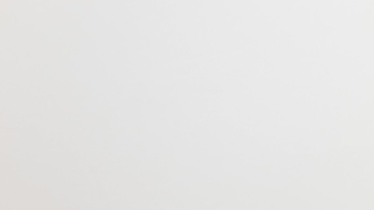 Stop Motion Animation_White paper ball unwrapping on orange background