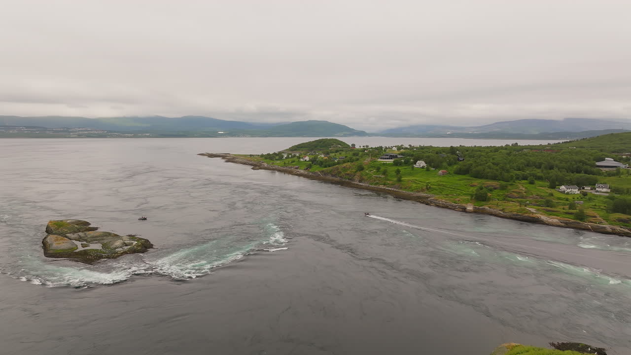 Tourist boats explore strong tidal current of Saltstraumen, Bod&oslash;, Norway