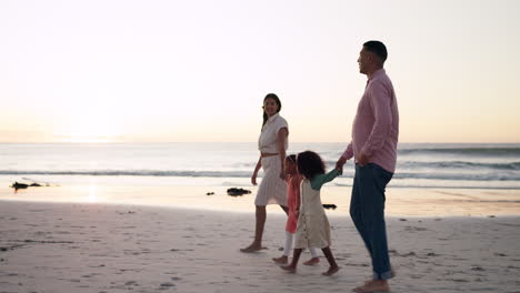 Family,-holding-hands-and-walking-at-sunset