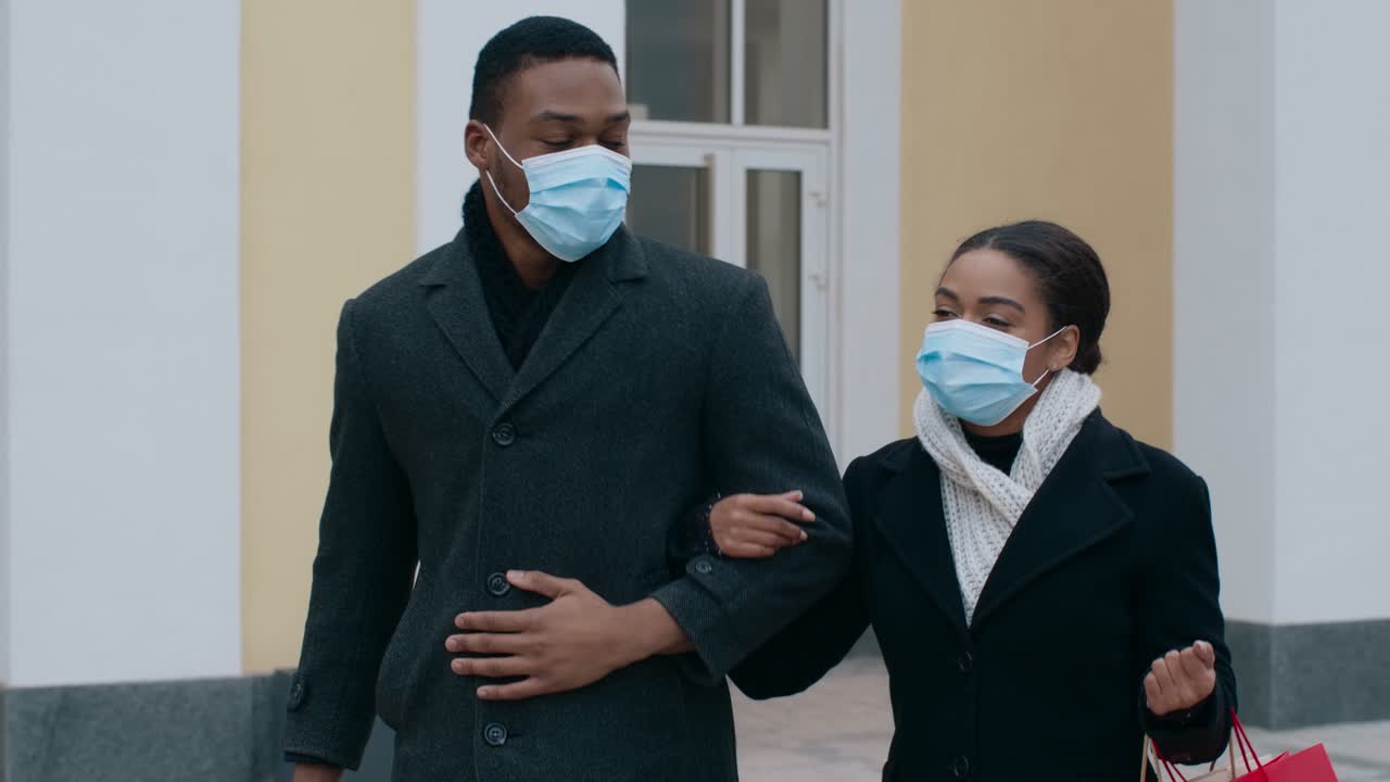 Couple Walking Outdoors During a Pandemic