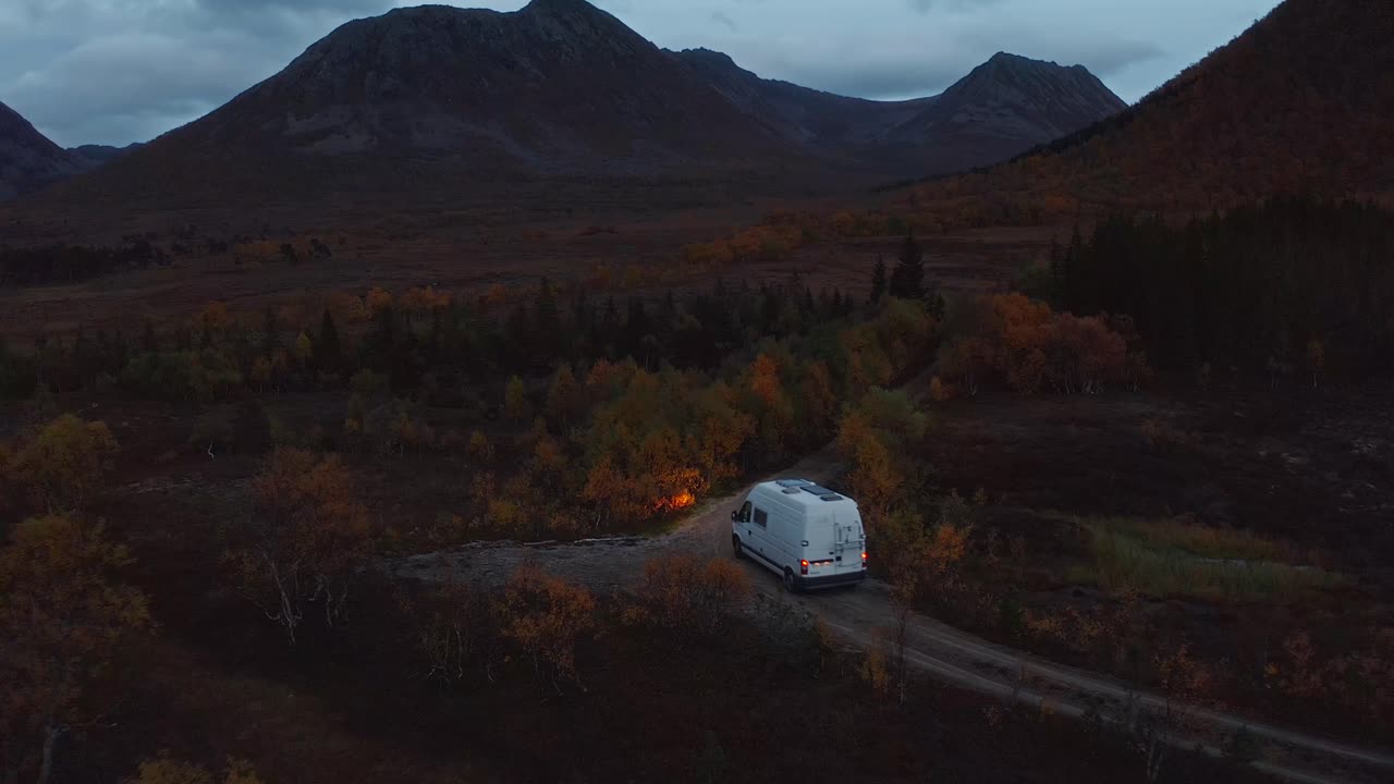 Lonely road in Vestarelen, RV driving through a rugged mountainous landscape