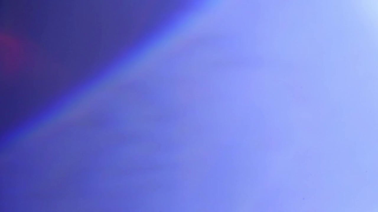 Abstract Light Leak Overlay with Soft Blue and Purple Tones