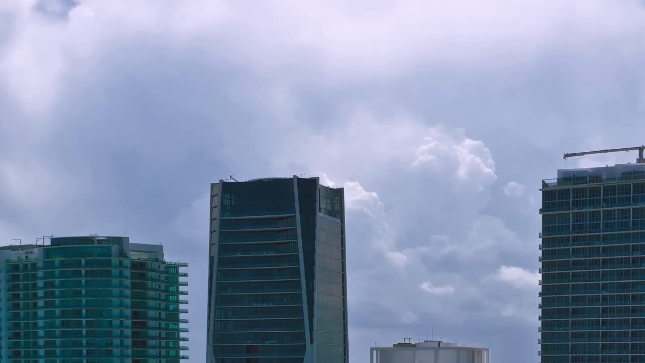 View of Miami skyline with buildings and cloudy sky taken from above
