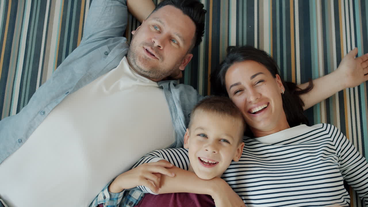 Happy Family Lying Down