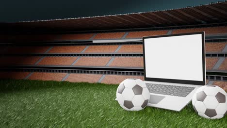 Animación-3d:-Dos-Balones-De-Fútbol-Junto-A-Una-Computadora-Portátil-Abierta-Con-Pantalla-Blanca-En-El-Campo