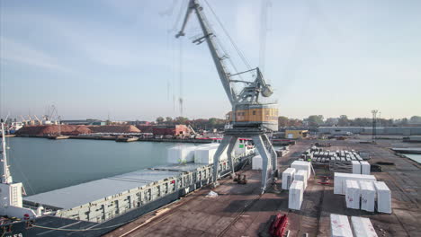 time lapse shot of crane at harbor loading