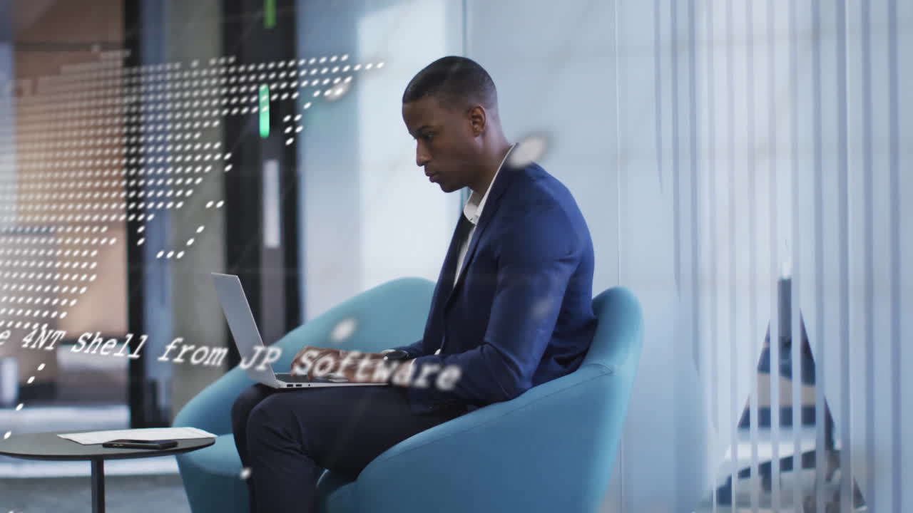 Animation of financial data processing over african american businessman using laptop
