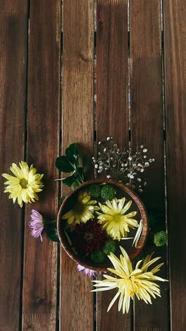 floral arrangement on wooden table