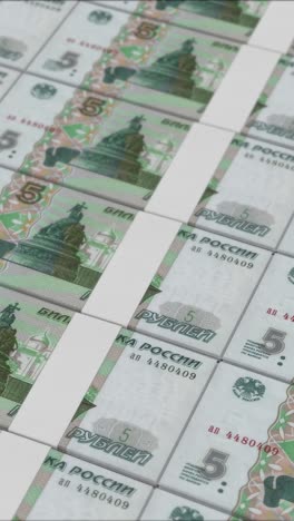 vertical video of 5 russian ruble banknotes printing by a money press