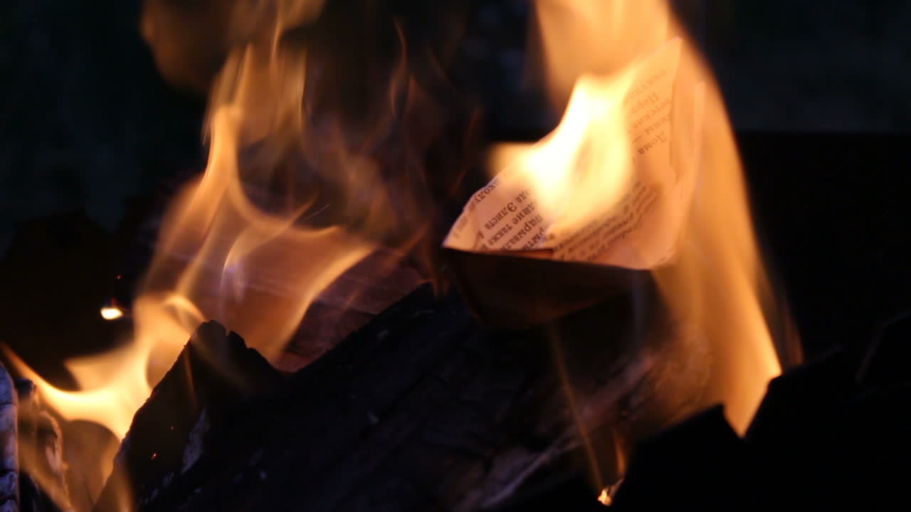 Close Up Of Paper Burning In Flame. Flame when burning the paper in the bonfire
