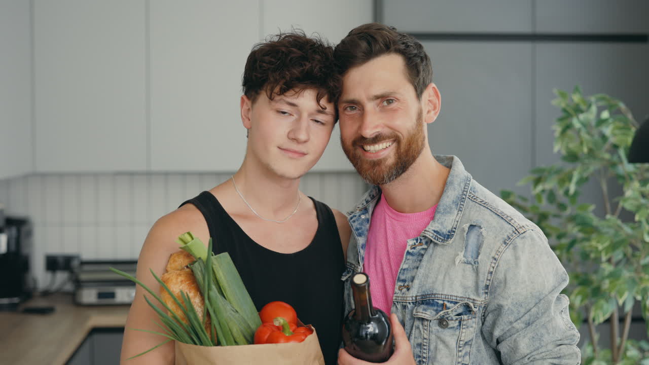 Happy Gay Couple Shopping for Groceries and Wine