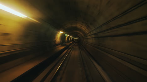 A-First-Person-View-Of-The-Subway-Tunnel-Movement-In-A-Circular-Tunnel-Creates-A-Hypnotic-Effect-4k-