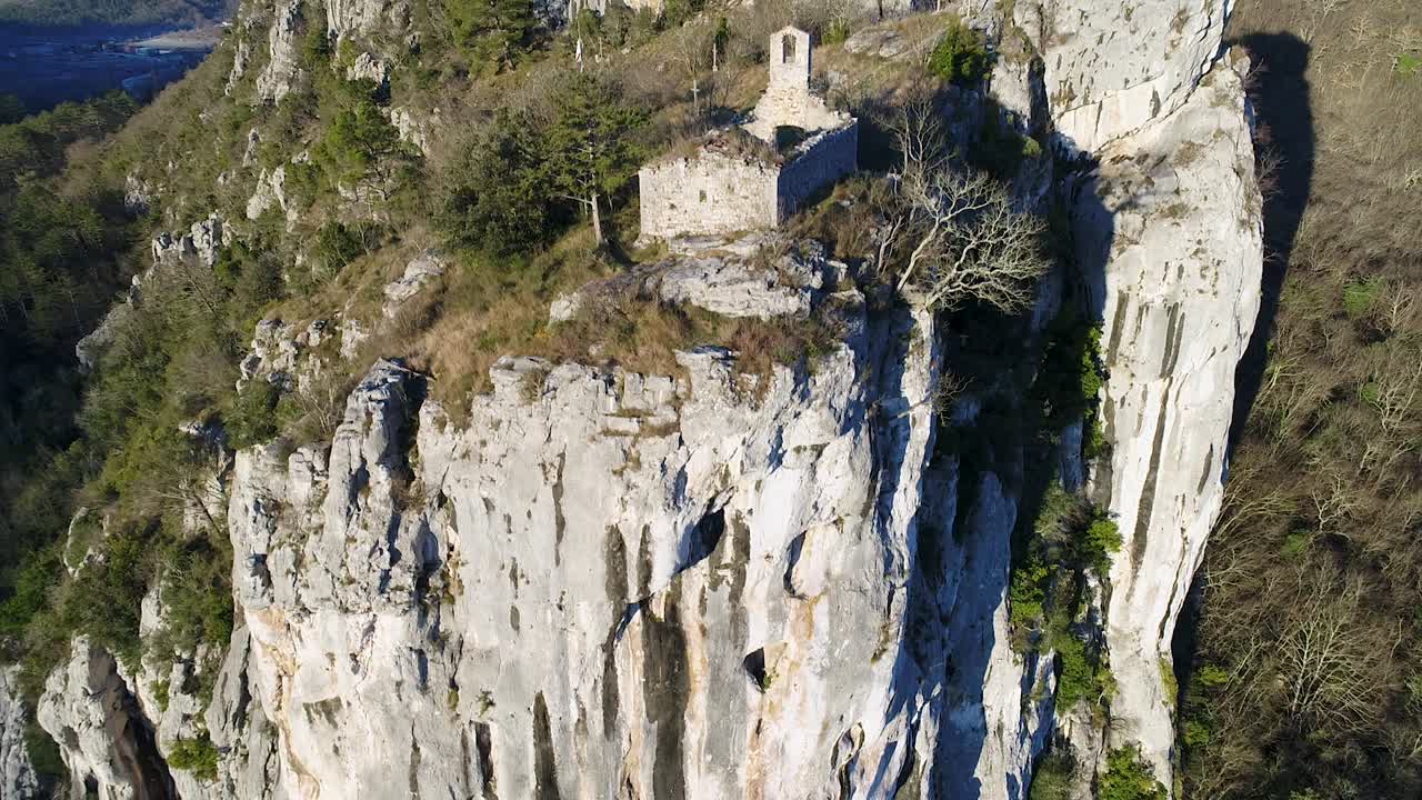 Aerial Pedestal Up View Of Cliffside With Abandoned Ruins Of Church In Motovun, Croatia