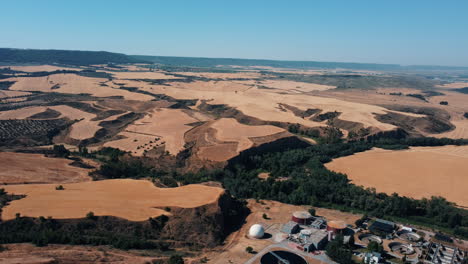 aerial view of agricultural fields and water treatment plant