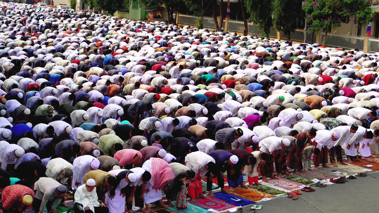 Indonesian muslims praying on the street