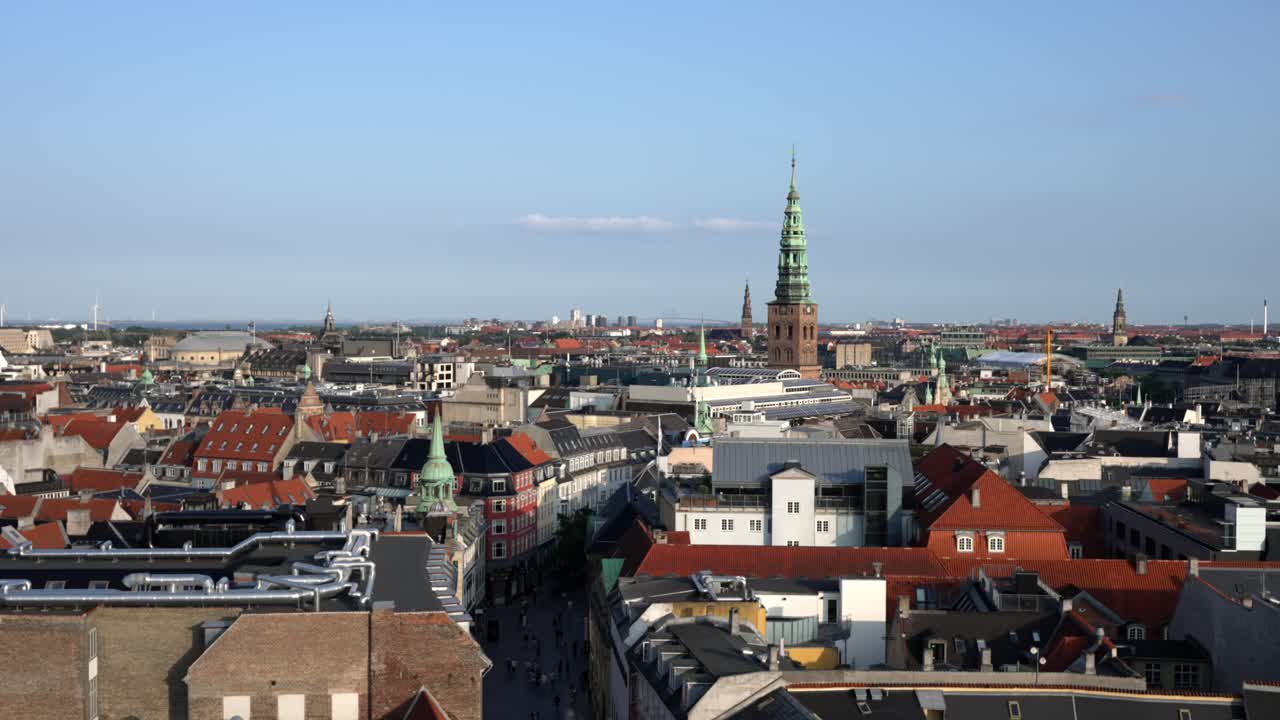 Copenhagen cityscape from Vor Frelsers Kirke, iconic spiral spire.