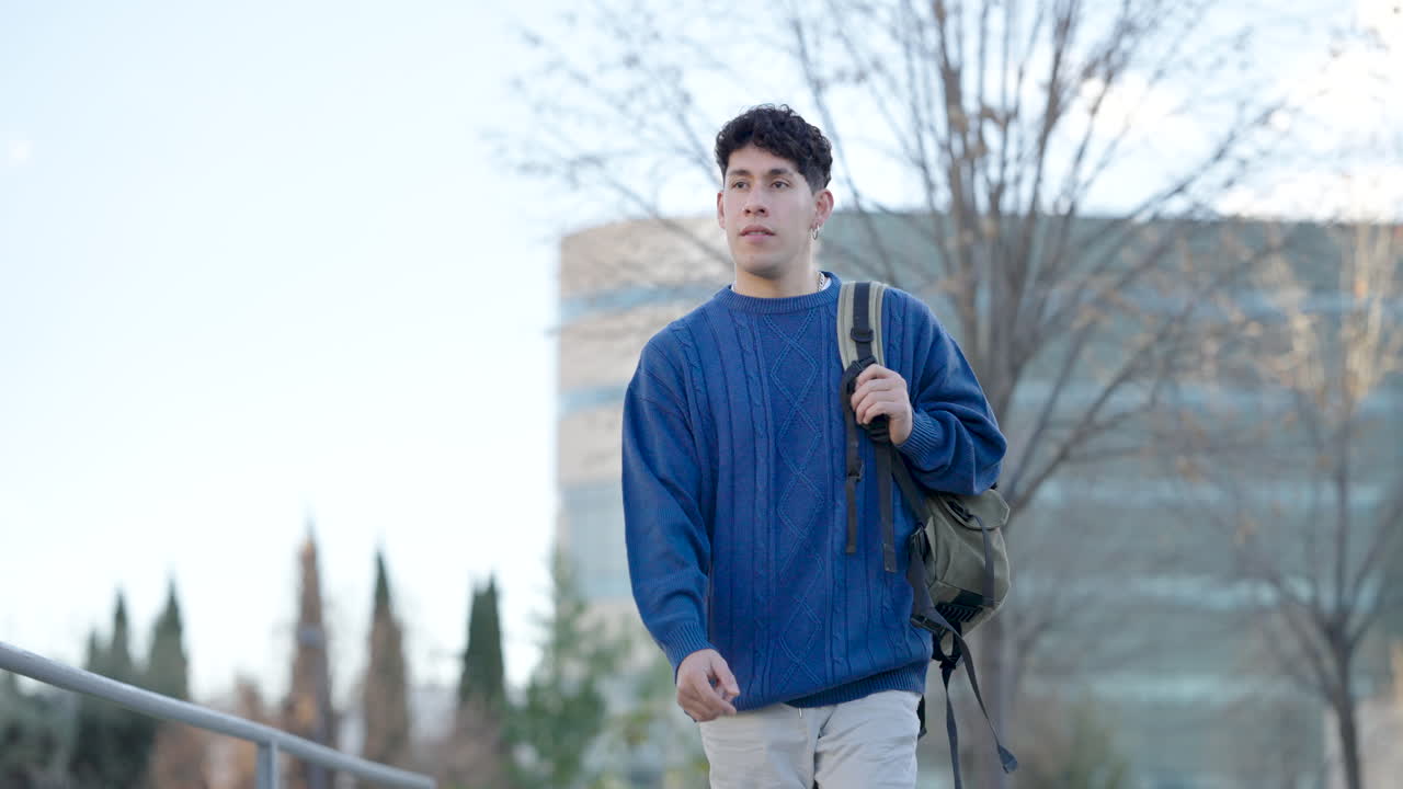Young student walking on campus