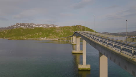 Aerial-drone-flies-along-Sommaroya-Island-Bridge