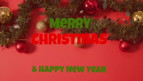 animación del texto de feliz navidad sobre las decoraciones navideñas