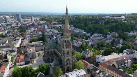 Aerial view of the Cathedral of the Immaculate Conception towering over central Linz. Linz, Austria