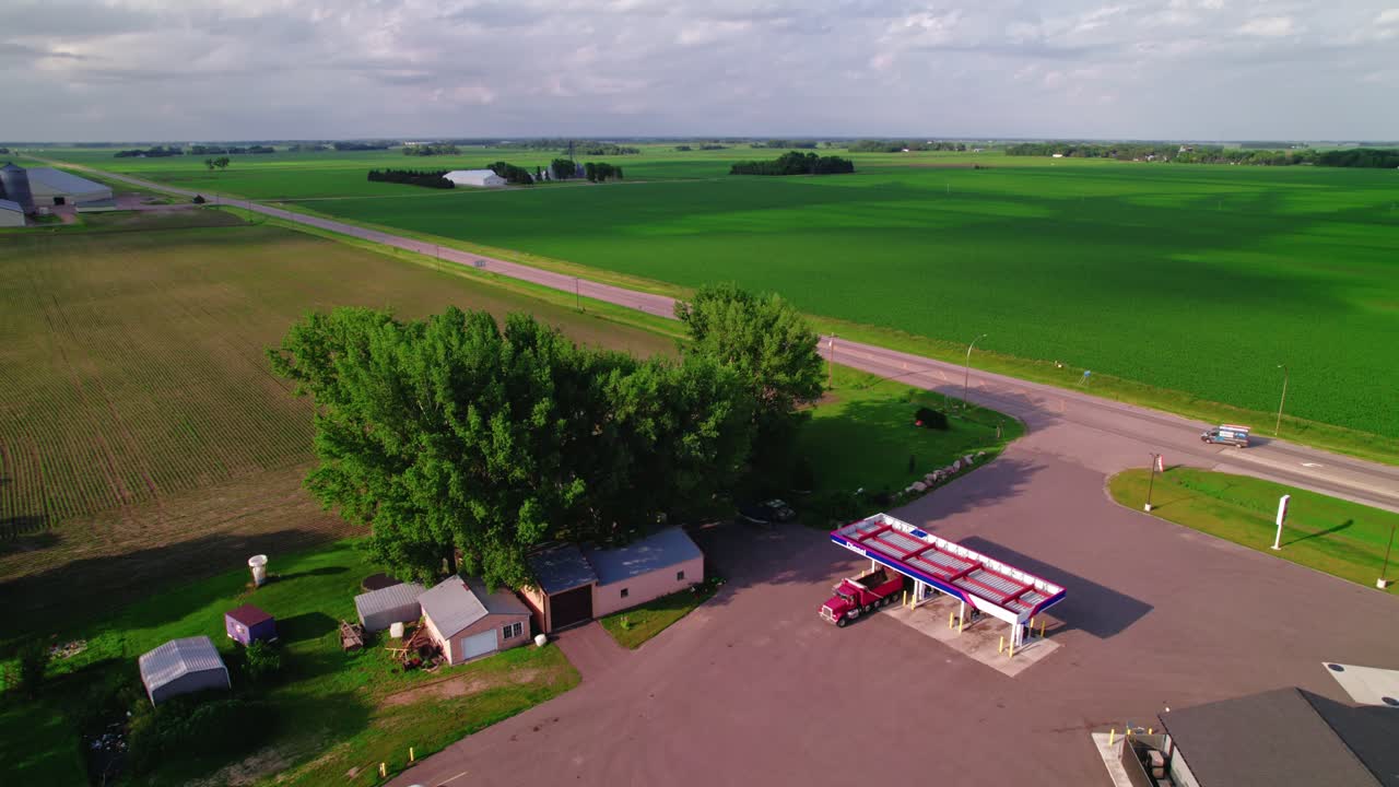 Aerial view of a truck stop in Minnesota, USA, showcasing logistics and roadside activity.
