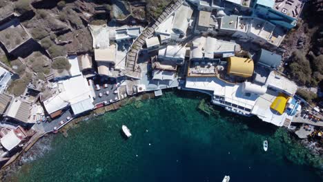 aerial view of the port of ammoudi near oia on the cliff of the santorini caldera