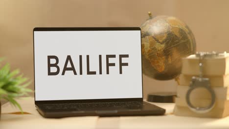 bailiff displayed in legal laptop screen