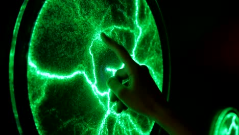 woman touching plasma panel display