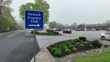 sign for newark country club. golf course theme