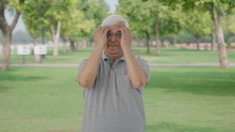 Happy-Indian-old-man-getting-ready-in-park