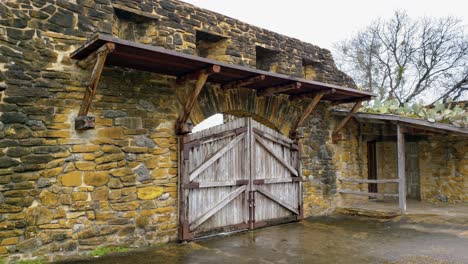 old fort gates and housing in compound of chapel mission grounds