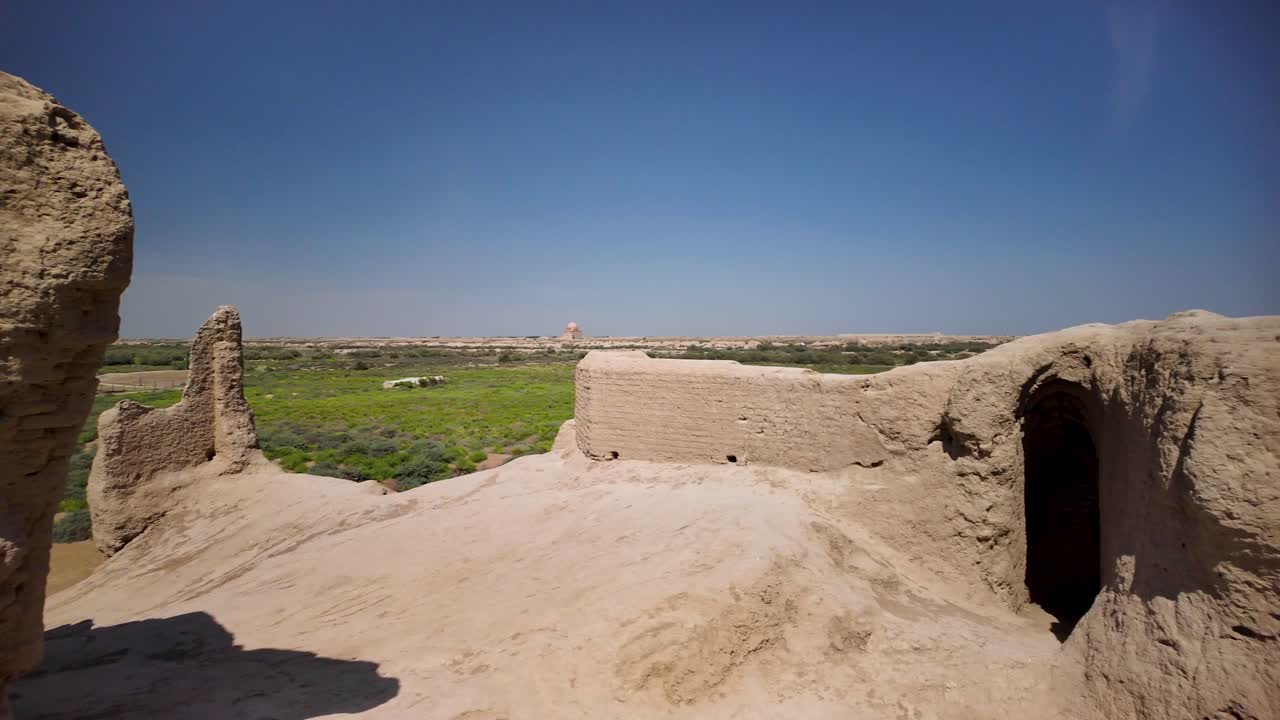 Panning view of some of the ruins of city of Merv, Turkmenistan on sunny day