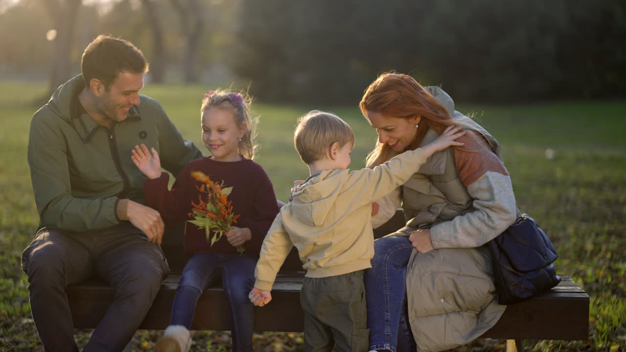 Family enjoying autumn in the park