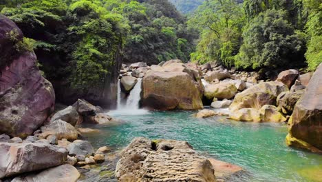 4k aerial truck right down shot of a water pool near rainbow falls in nongrigat, cheerapunji, meghalaya