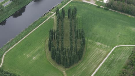 The-Green-Cathedral-Created-by-artist-Marinus-Boezem,-this-land-art-project-was-established-in-1987-in-the-polder-landscape-near-Almere,-aerial