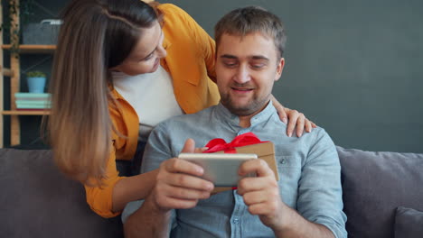 couple celebrating a gift exchange